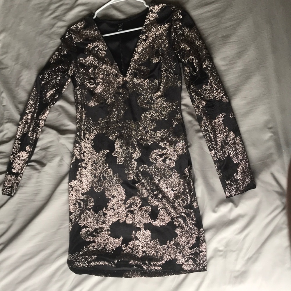 Sparkly black body con dress